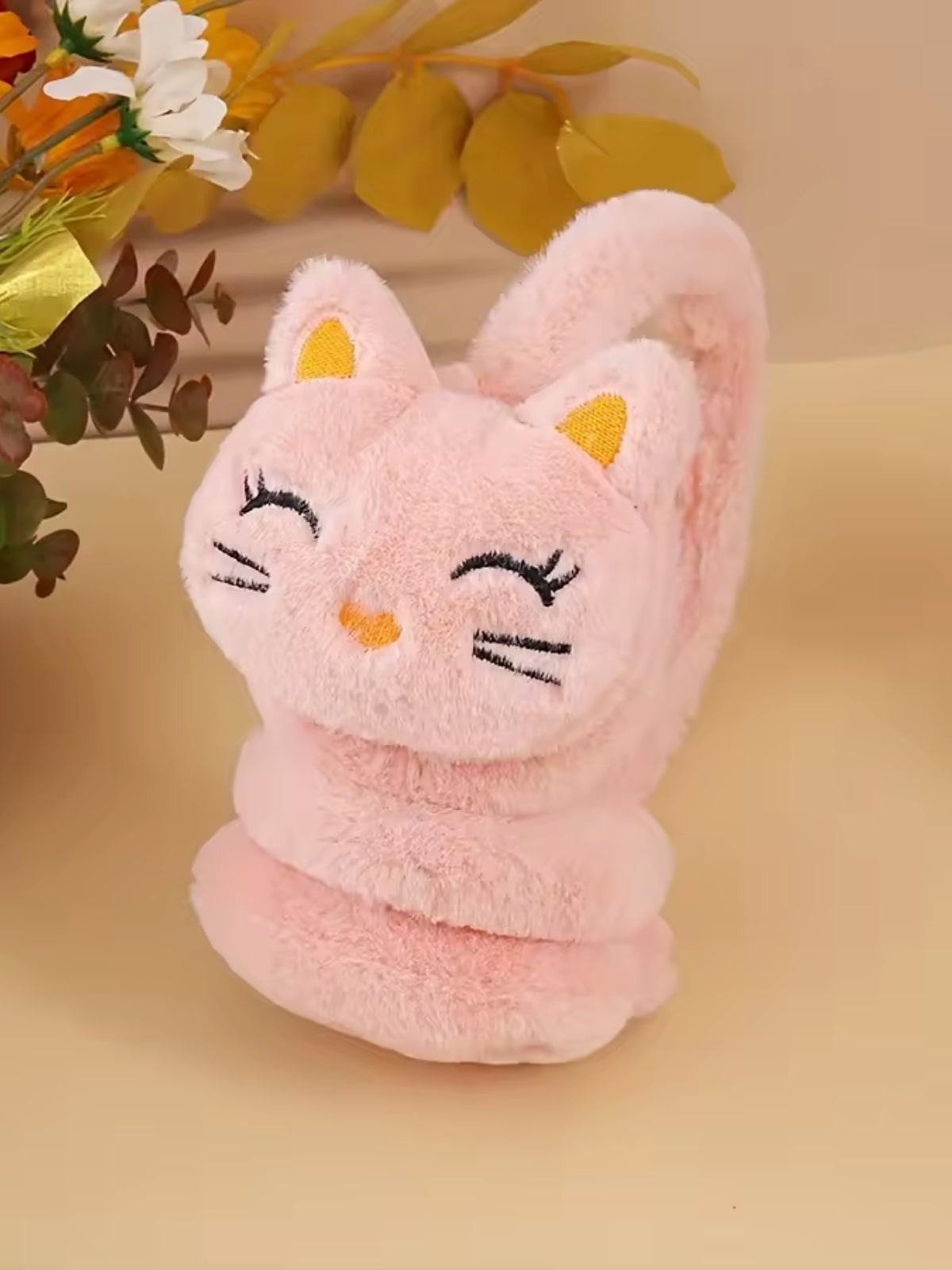 Cache oreille fille avec un design de chat rose clair